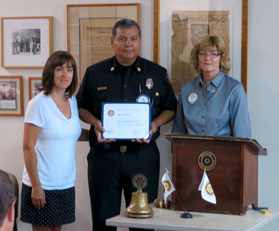 (l-r) Laura Landeros, Rigo Landeros, President of Fillmore Rotary and recipient of the Paul Harris Award and Martha Richardson.
