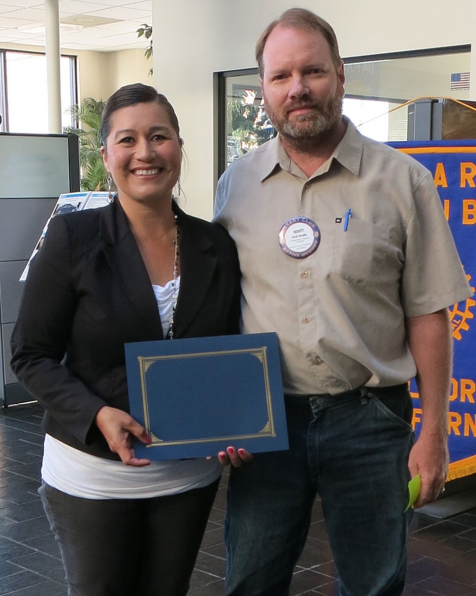 Cynthia Frutos, Principal of Sierra High School, was presented with a Certificate of Appreciation by Rotary member Scott Beylik