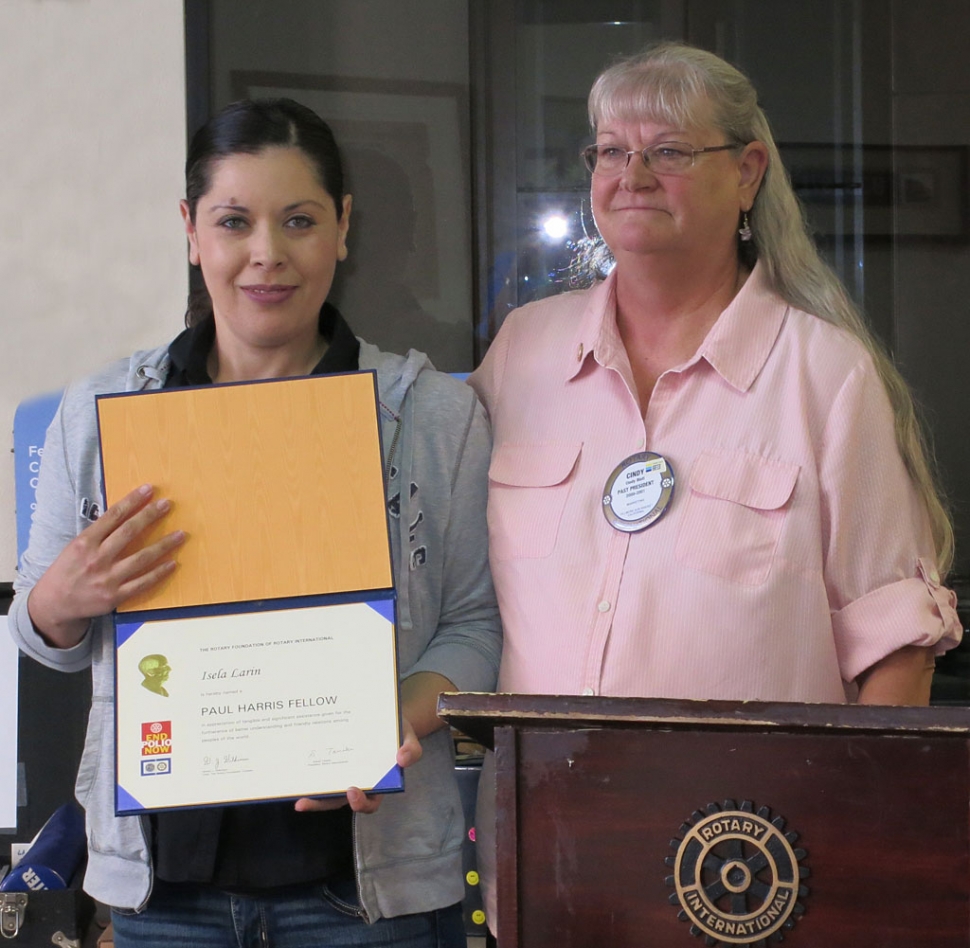 Isela Larin, Career Technician, was presented with a Paul Harris Fellowship Award by Cindy Blatt, Rotary Secretary.