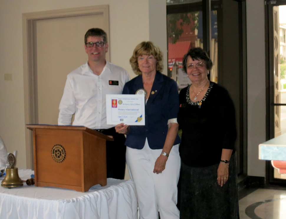 Sean Morris, Rotary President and Martha Richardson, Secretary were presented with a certificate from Rotary International recognizing 90 years of service. It was presented by Loretta Butts, 2014-2015 District Governor.