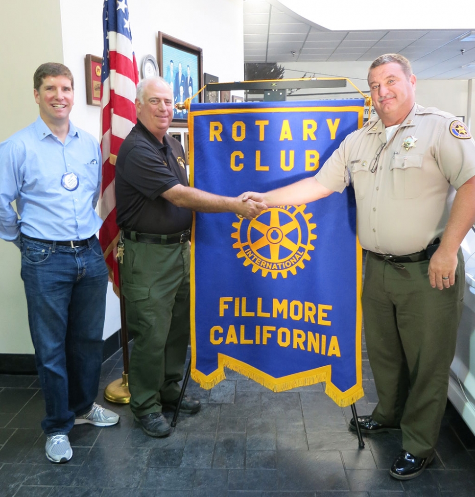 Jerry Peterson is inducted into the Rotary Club of Fillmore. Pictured are Sean Morris, President, Jerry Peterson and Dave Wareham, Fillmore Chief of Police.