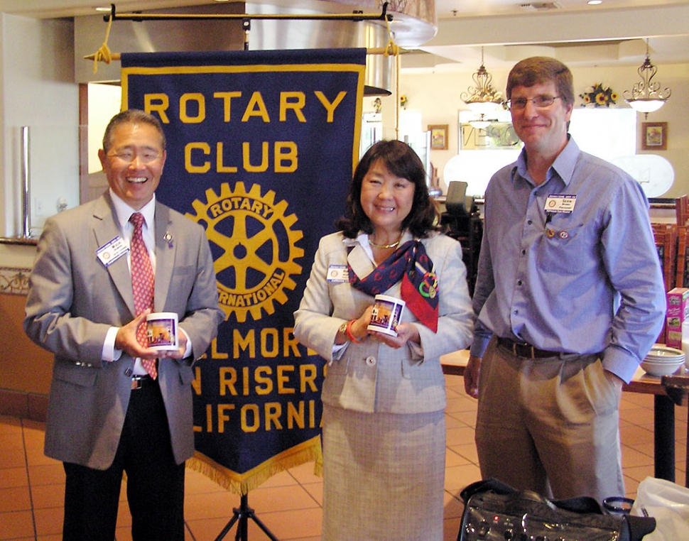 District Governor Wade Nomura, with Roxanne and Rotary President Sean Morris.
