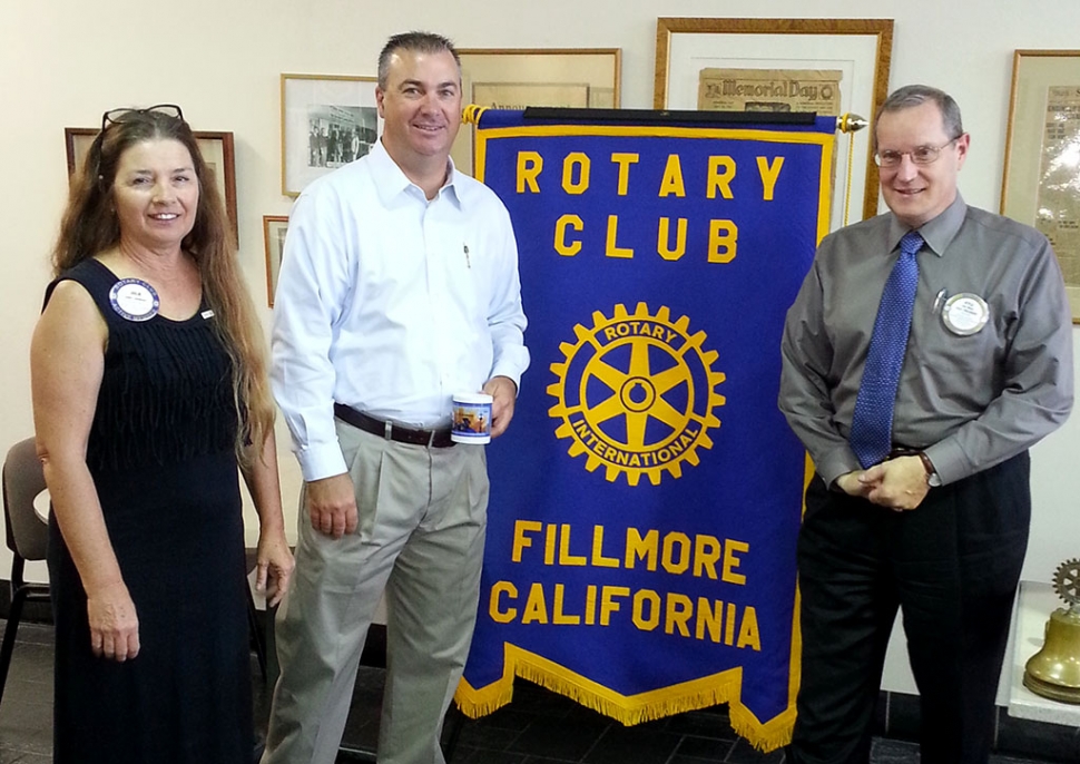 (l-r) Program Chair Julie Latshaw, City Manager David Rowlands, Club President Kyle Wilson