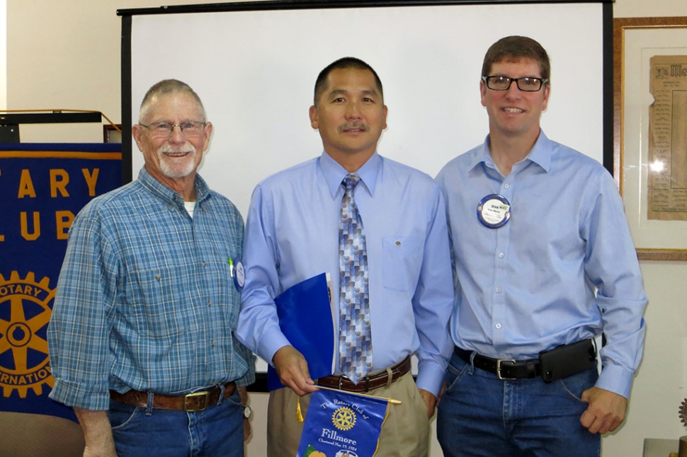 Rotary Club of Fillmore inducts new member. Bob Hammond, sponsor, Tom Ito, Principal of Fillmore High School, and newest member of the Rotary Club and Sean Morris, President.