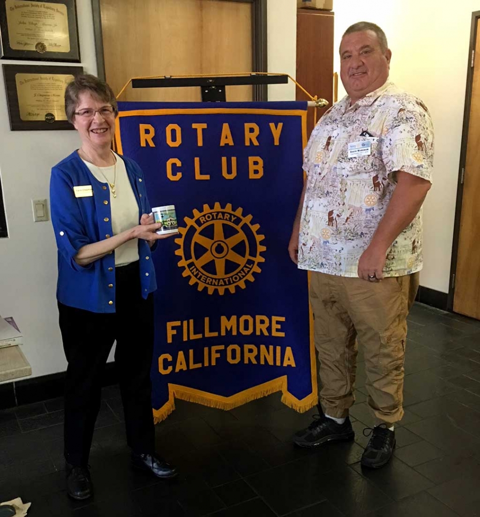 Fillmore Rotary Club hosted Carol Chapman, Ventura County Library Adult Literacy Program Manager, who spoke on the different styles of teaching adults to read and how this free program has changed people’s lives. Information on this free service can be obtained at any VC library. Pictured is Rotary member Dave Wareham presenting Carol with a Rotary mug as a thank you. Photo courtesy Martha Richardson.