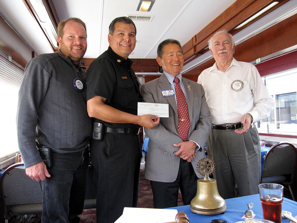 (l-r) Scott Beylik, Rigo Landeros, District Governor Nomura and President Floyd Griffin.
