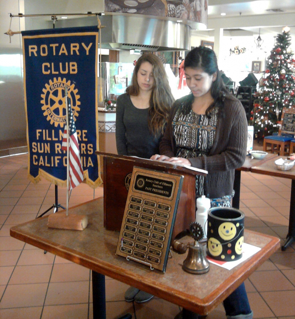 Left is Laura Garnia, right is Cassandra Galvez speaking to Sun Risers about their RYLA experience.