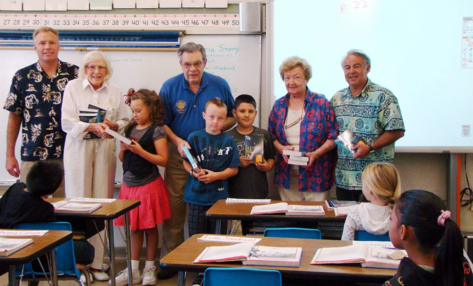 The Fillmore Rotary Sun Risers each year give third grade students a brand new dictionary to keep. The teachers are very appreciative of this as they are a definite asset when the students are working on their academic studies. Pictured are: Scott Olson –third grade teacher at San Cayetano, Rotarians: Ruth and Don Gunderson, Marge Le Bard and Tim Gurrola. Students pictured are Hannah, Dylan and Ivan.