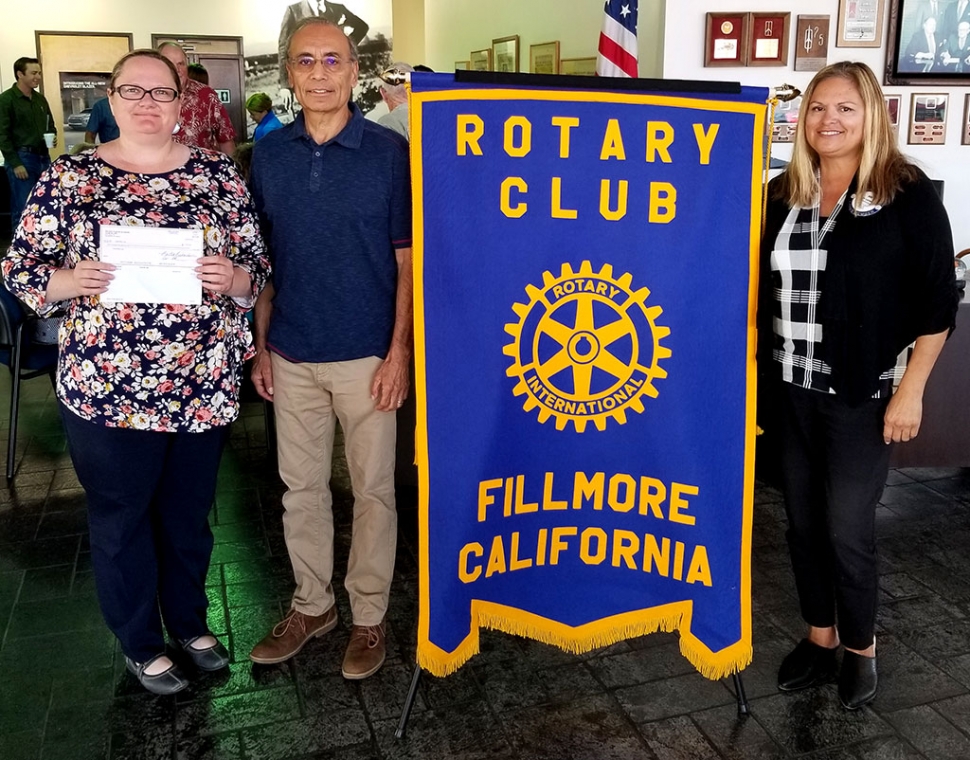 The Rotary Club of Fillmore made a $150 donation to Grad Nite Live on behalf of Rotary 5K Team Challenge winner Pro Body Fitness. Pictured (l-r) are Alicia Hicks who received the check on behalf of Grad Nite Live, Race Director Joe Aguirre, and President Ari Larson. Photo courtesy Martha Richardson.