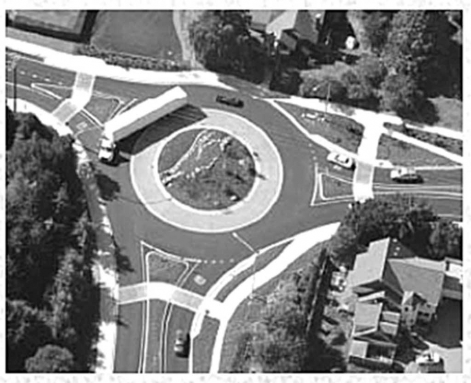 Pictured is a stock photo of a roundabout.