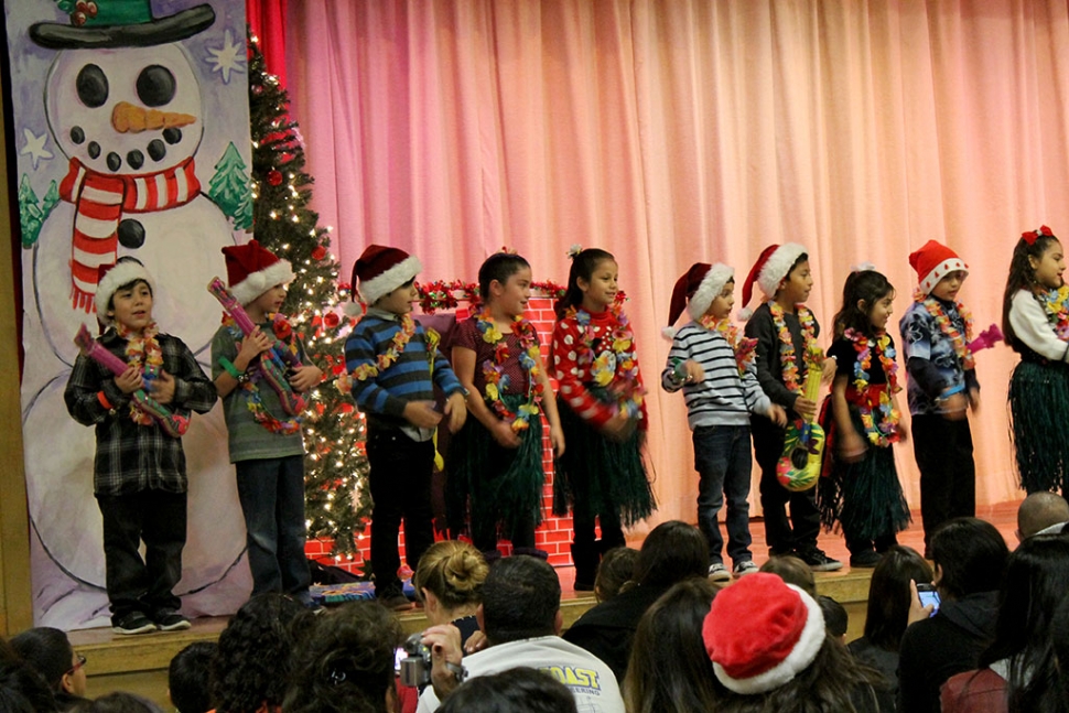Santa and his helpers got into the Christmas groove at the San Cayetano Christmas program last week.