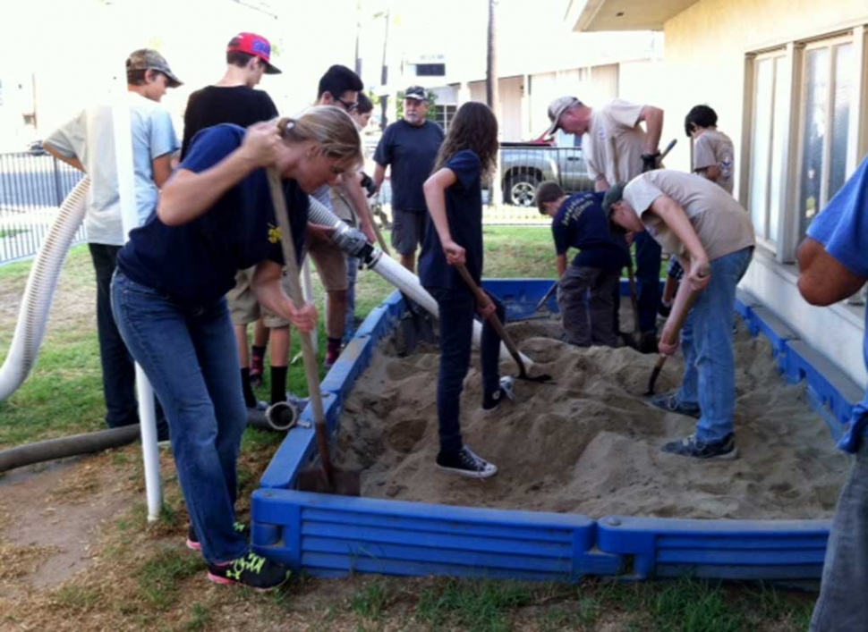 The troop showed up one evening, sucked the old sand out of the sandbox and filled it with new clean sand donated by Grimes Rock Inc. the scouts, with a little help from a few friends, worked quickly and cooperatively with shovels and wheelbarrows to fill the box to the top. The preschool students are very happy to once again dig and play. Thank you to Luke and Loni Larson for coordinating this effort.