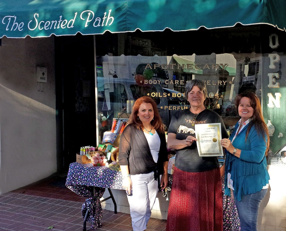 (l-r) Theresa Robledo, Board Director, Janine Rees, Owner of The Scented Path, Cindy Jackson, President.