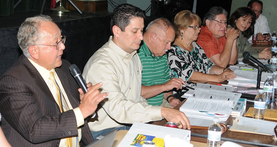 Superintendent Nishino and Board Members discuss the budget cuts.