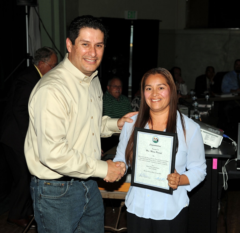 Board Member John Garnica and Migrant Parent of the Year Maria Pascual