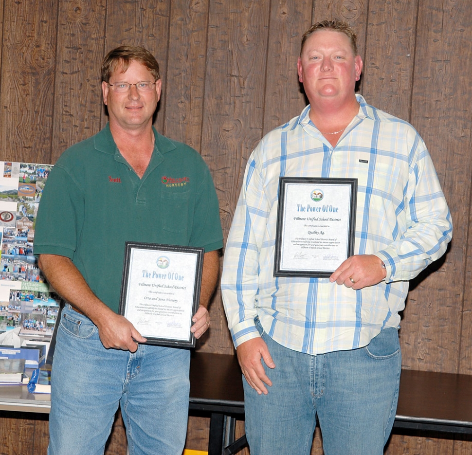 Two Fillmore Businesses were honored at Tuesday night’s FUSD Board meeting: Otto & Sons Nursery, and Quality Ag Inc. Both businesses helped prepare for the coming FHS 2010 graduation. Left is Otto & Sons owner Scott Klittich, right is Mike Richardson, with Quality Ag Inc., both holding their award plaques.