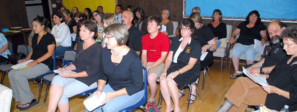 Most of those attending Tuesday night’s school board meeting wore black in protest of the recent decision to reassign Evalene Townend to a newly created position. Townend is dealing with credible allegations of serious misconduct relating to communications with a teacher’s union official.