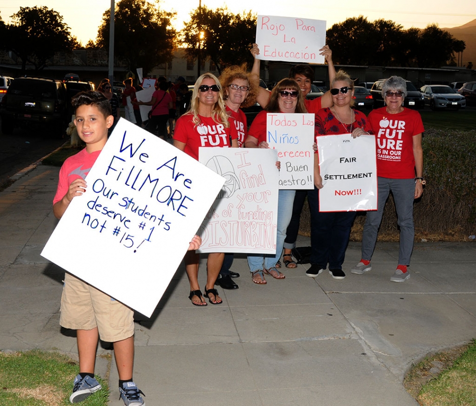 Members of the Fillmore Unified Teachers Association, along with parents and community members, picketed the FUSD building, with cars driving by honking in support.