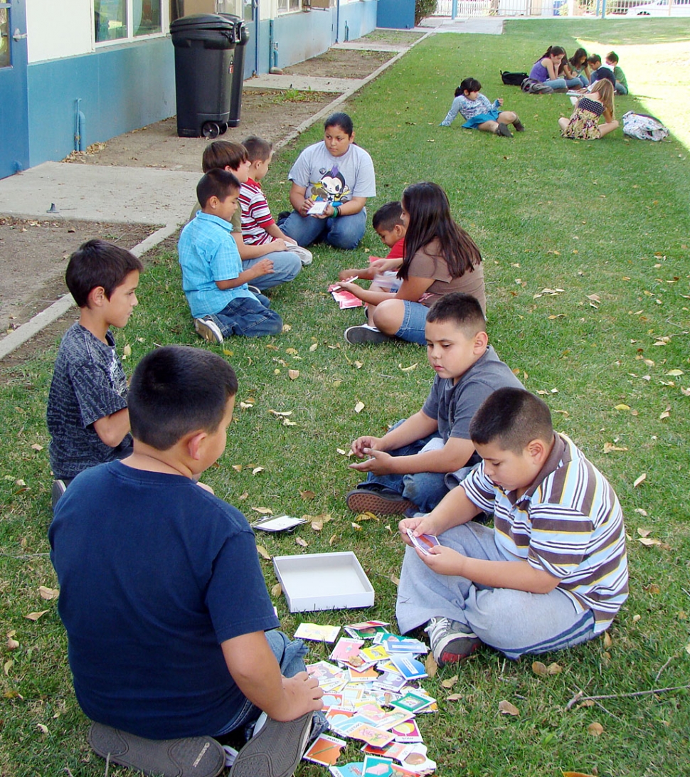 A group of 4th and 5th grade students at San Cayetano School have been working twice a week with students from all four of the first grade classes. The 4th and 5th graders have been working on skills such as letter names and sounds, compound words, sight words, addition, and oral sentences.