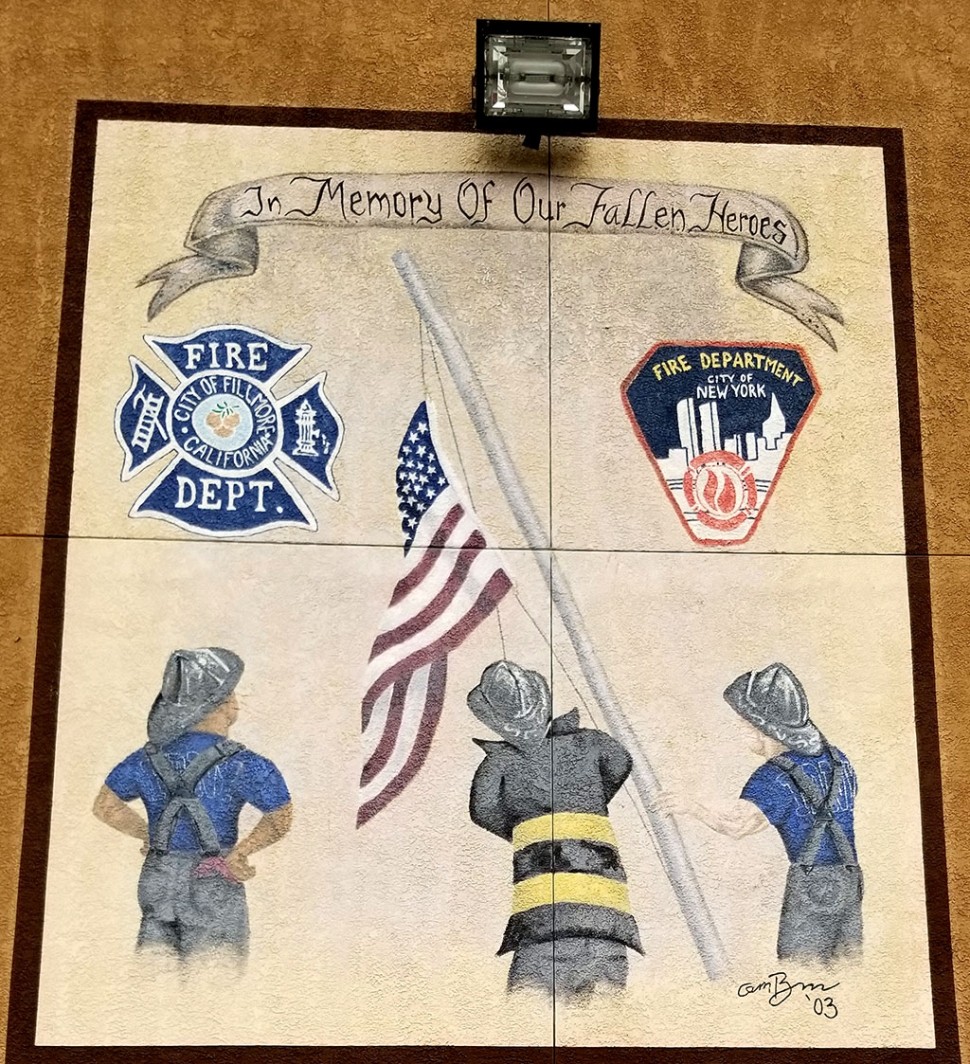 A memorial painted on the side of Fire Station 91 in honor of our fallen heroes.