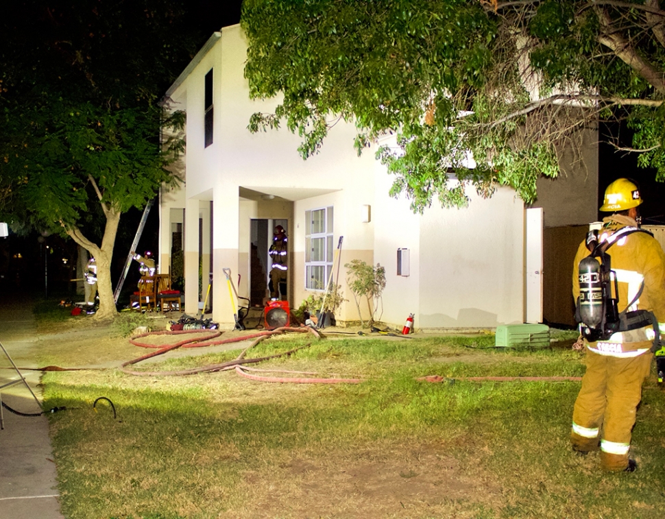 On Sunday, September 5th, 2021, at 8:07pm, the Ventura County Fire Department and Fillmore City Fire were dispatched to a reported structure fire at the Rancho Sespe apartment complex. Arriving fire crews reported a 2-story apartment
complex with smoke coming from one upstairs unit. Firefighters quickly knocked down the fire 15 minutes after arriving on scene. An initial primary search was made and all occupants were accounted for. Fire crews determined the fire did not spread into the attic and was primarily confined to the one unit. Crews remained on scene for about three hours. Fire investigator was also on scene. There were no injuries. Cause of the fire is under investigation. Photo courtesy Angel Esquivel—AE News.