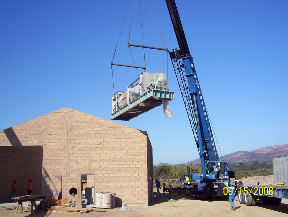 Last week the screw press was lifted into place in the new Water Recycling Plant. The screw press separates the solids from the waste water after treatment in the plant. The screw press presses the water out of the solids then the solids will be trucked to Toland Road landfill where they will be dried with landfill gas. After drying they can be used as a soil amendment.