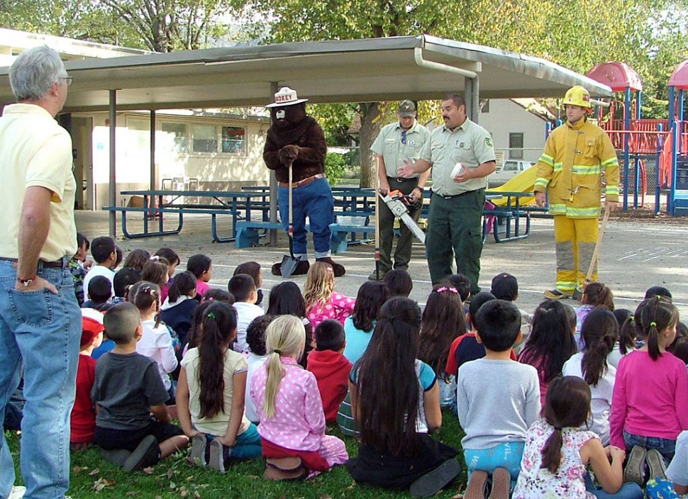 The classes decorated their doors for a contest on Monday. Tuesday the students wore their sports jerseys or shirts. Wednesday they wore red. Thursday was pajama day and to top off the week, Friday was their costume parade. We also had Smokey the Bear come visit our students this year. The kids enjoyed having Smokey on campus. Photos of Smokey taken by Christine Parrish.