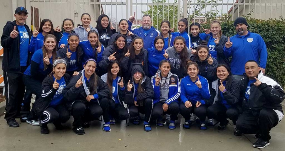 Pictured above are the Lady Flashes posing for a picture with John Holladay (pictured top row center) for his support and contribution to assist the team with their purchase of CIF Championship rings. Fillmore competed in the State Championships on Saturday, March 10th and fell to San Gabriel Mission by the score of 2-1.  The Lady Flashes came out strong and missed on a couple of early opportunities.  San Gabriel Mission was up 1-0 at half time.  Mid way through the second half they got a goal and went up 2-0.  Fillmore battled back, Ana Covarrubias headed in a cross to put the team on the score board.  As Fillmore was gaining momentum the time ran out. Being able to compete in the State Championship was icing on the cake for the Lady Flashes.  I would like to thank the community for all your good thoughts and prayers for the team as they embarked in this amazing & memorable journey.  The Lady Flashes were honored on Tuesday, March 13th at the Board of Supervisors with a Resolution for their CIF Southern Section Division 7 2018 Championship. Submitted by Coach Omero.