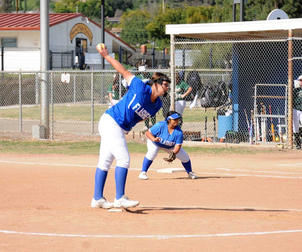 JV Pitcher Zoie Isom pitches against St. Bonaventrue's batters.