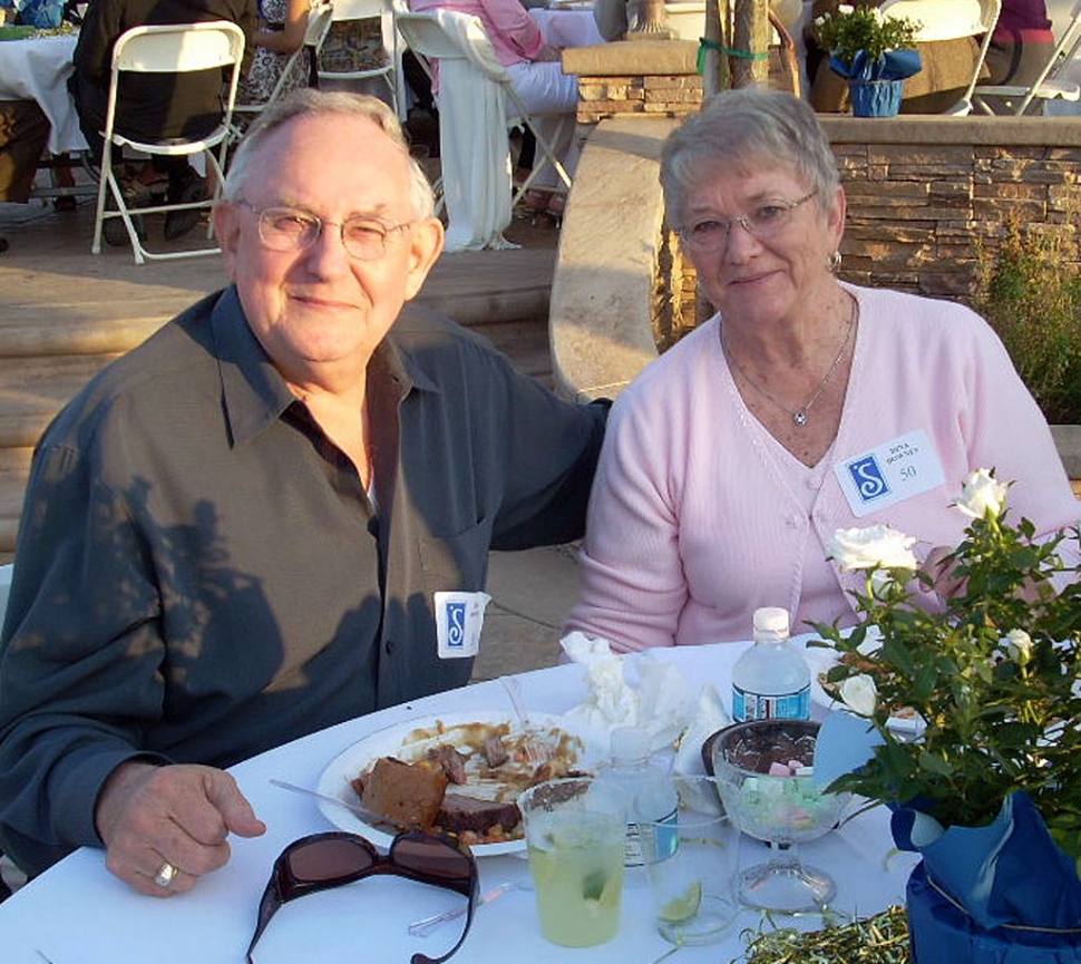 Don Downey and wife Deena enjoy the cool summer night at the Herrera home.