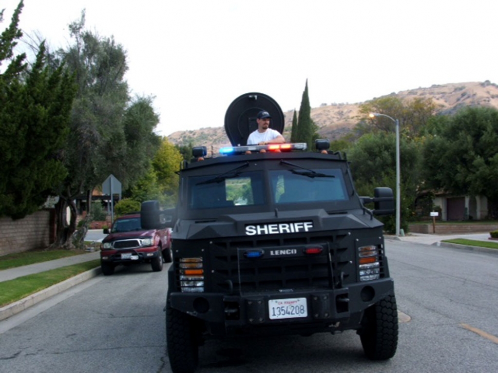 Daniel’s dream came true; here he is riding in a Ventura County Sheriff’s S.W.A.T. vehicle, in the Fillmore May Festival Parade last month.