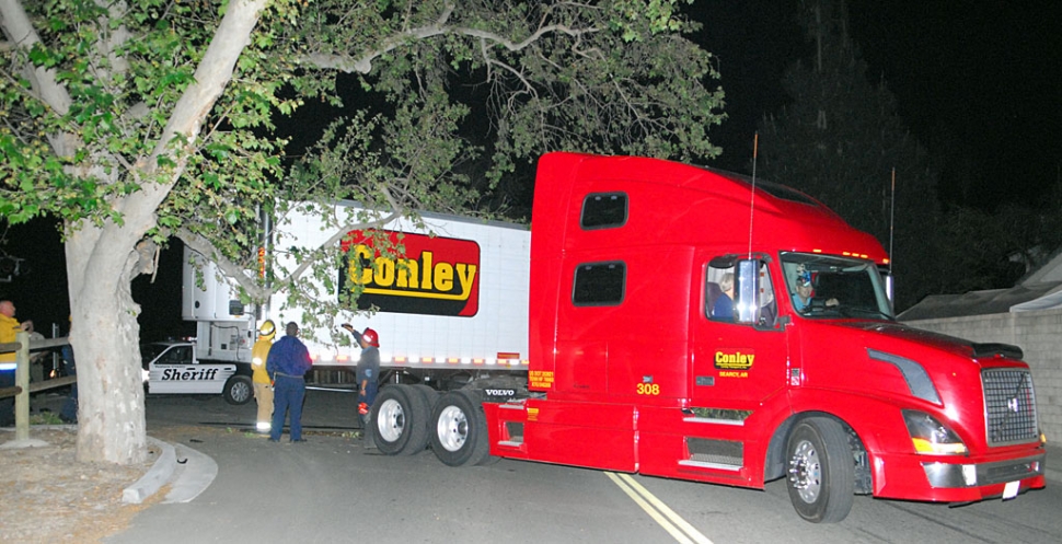 Sometime around 8:00 p.m. the driver of this beautiful 18-wheeler decided to make a U-turn on Old Telegraph Road at ‘B’ Street. The attempt was unsuccessful.