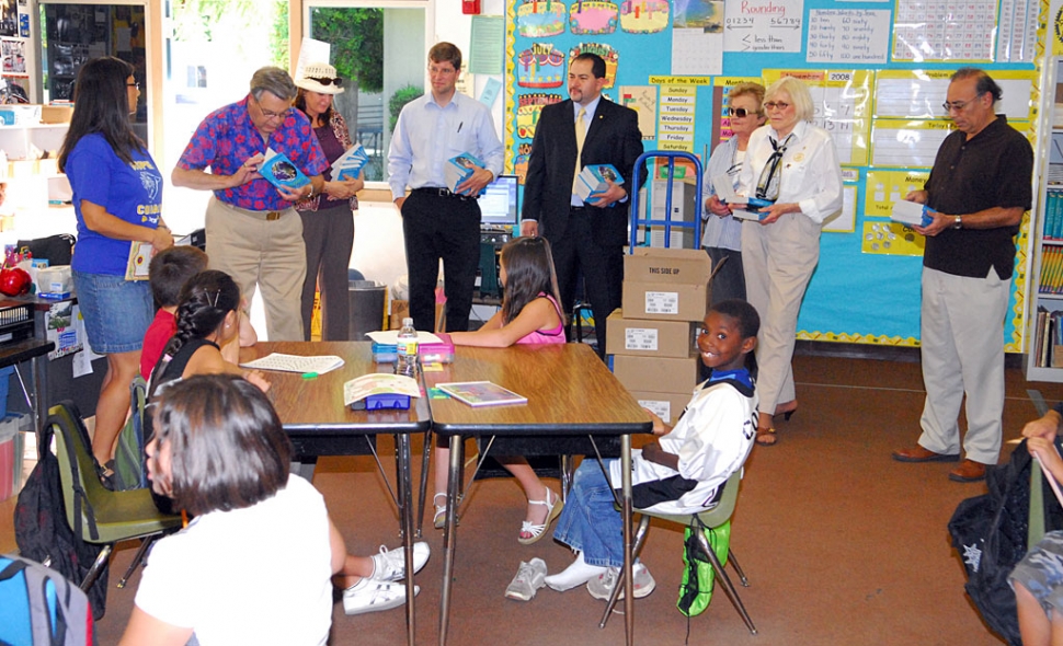 On Friday November 14, the Sunrisers Rotary went around to all the third grade classes in the Fillmore Unified School District and also the Fillmore Christian Academy and handed out 375 dictionaries to each third grade student. Pictured above; Sean Morris, Joe Aguirre, Terry Aguirre, Marge Lebard, Ruth Gunderson, and Don Gunderson, with Ms. Gonzales’s class at Sespe School.