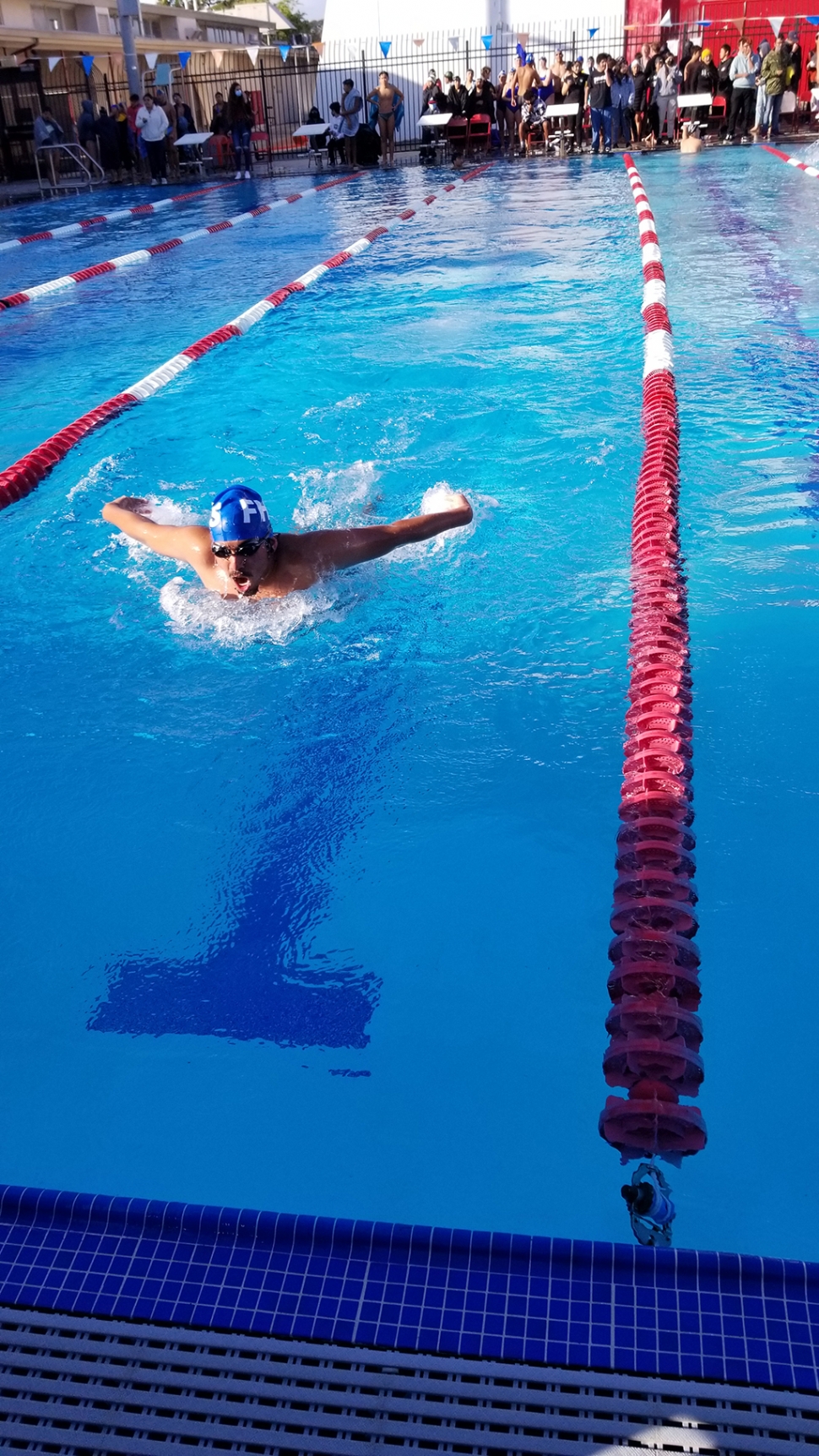 Fillmore’s Omar Aguilar swimming butterfly at the Raider Relay meet.
