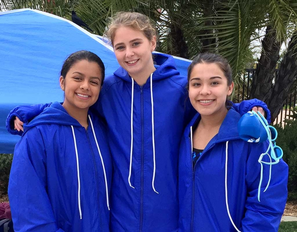 Congratulations to Katrionna Furness (pictured above center), Fillmore Girls Swim Team member. Kat, a junior, broke two FHS school records at Friday’s home meet: in the 200 Freestyle her time was 2.07.8 (going into the event with a 2.08), qualifying for CIF consideration—the existing record was 2.12. In the 100 Backstroke her time was 1.04.2 (going into the event with 1.03.59), qualifying for auto CIF—the existing record was 1.17. Kat also qualified for auto CIF with a 26.2 in her 50 Freestyle at the VCS Swim Champs Prelims on Tuesday at the VC Aquatics Center. She will swim in the finals on Friday, placing 4th overall at the prelims. And congratulations to Daisy Santa Rosa and Reanne Guerra for their participation in the Prelims. These three girls were to participate in a relay at the prelims which had to be scratched due to a team member injury.