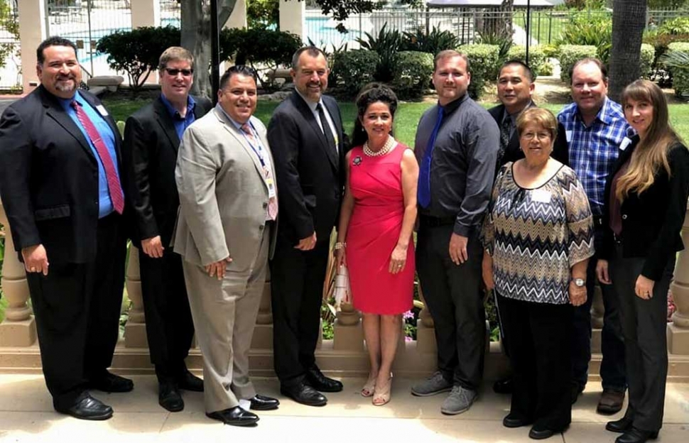 Centered is Jeremiah MacMahon of Fillmore High School and Laurie Merrill of Fillmore Middle School pictured with the Fillmore Unified District Administrators and Board Members at the Ventura County Innovates 2018 Pathfinder Awards where both Jeremiah and Laurie were recognized as this year’s most innovative educators, business and community partners for their support of Career and Technical Education.