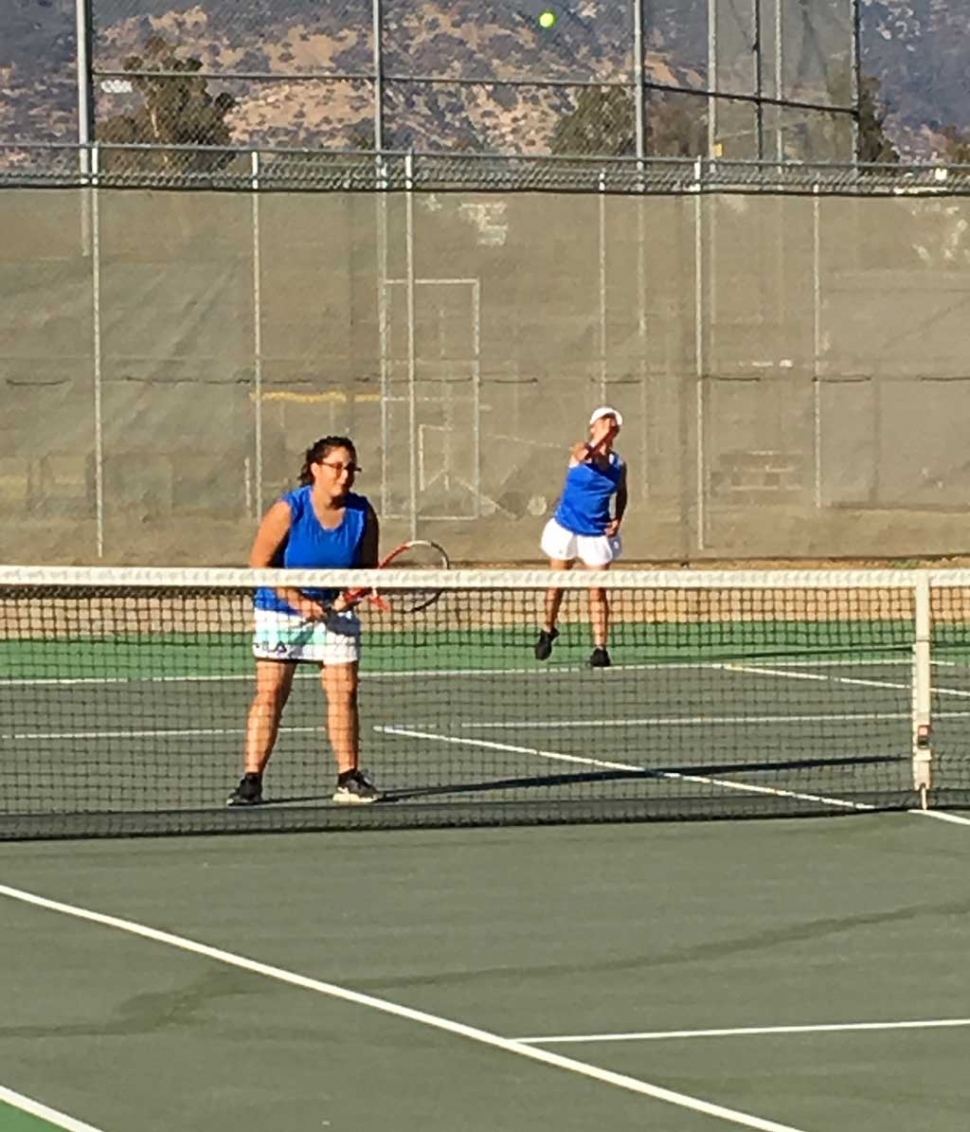 Lady Flashes Karime Renteria and Briana Lopez as they play in a doubles match against Villanova. Photo courtesy Coach
Bowman. 