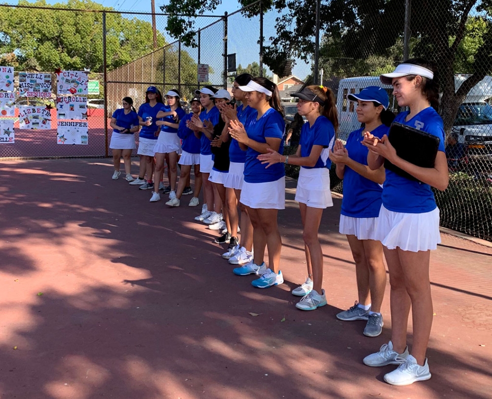 Pictured is the Fillmore Flashes Girl’s tennis team as they line up to get ready for their match against long time rival Santa Paula. Photo courtesy Coach Lolita Bowman.