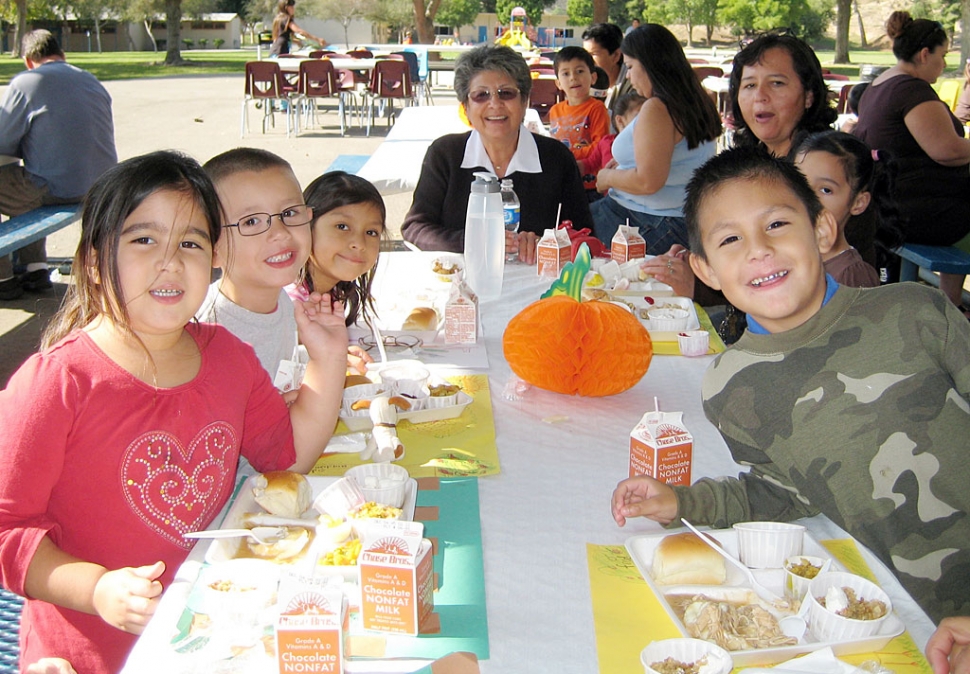 Liz Wilde and Piru students enjoy their pre-holiday feast.