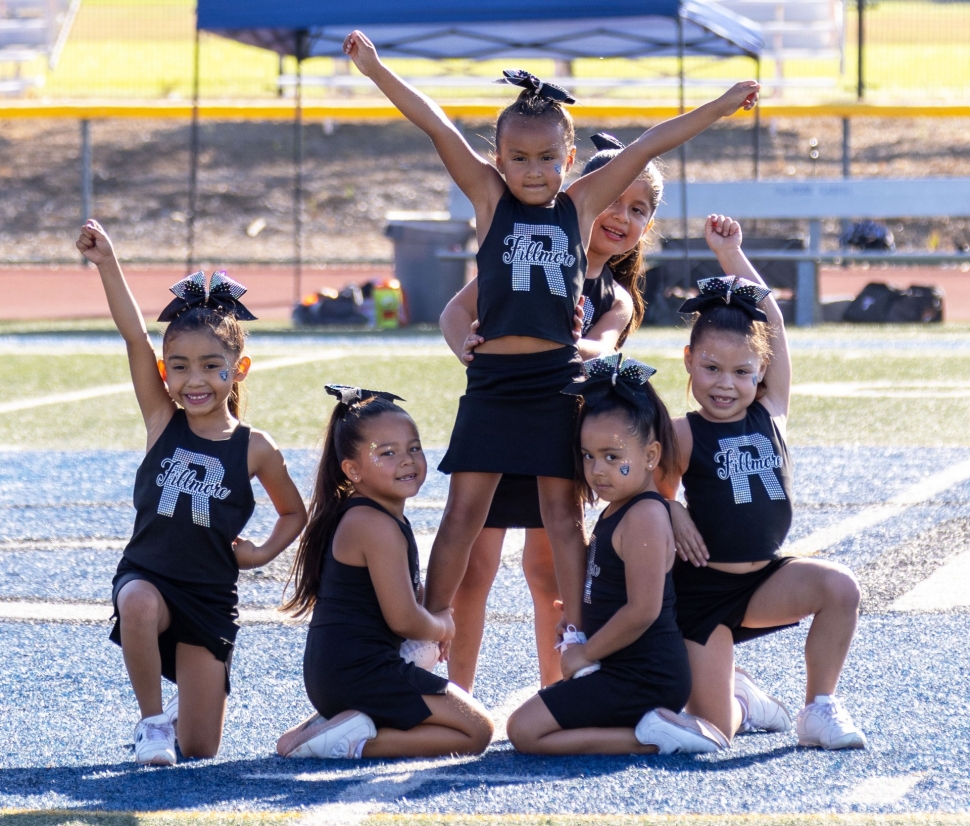 The Fillmore Raiders played Saturday, August 31. See all scores and more photos on page 9. Pictured above is the Fillmore Raiders Might Mite Black Cheer Squad during their halftime show.