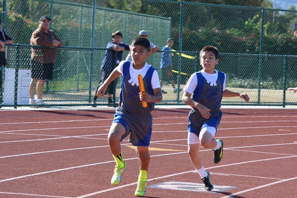 (l-r) Emilio Magana and Jimmy Carlos Midget Boys 4X100m relay first place with 59.99 sec.