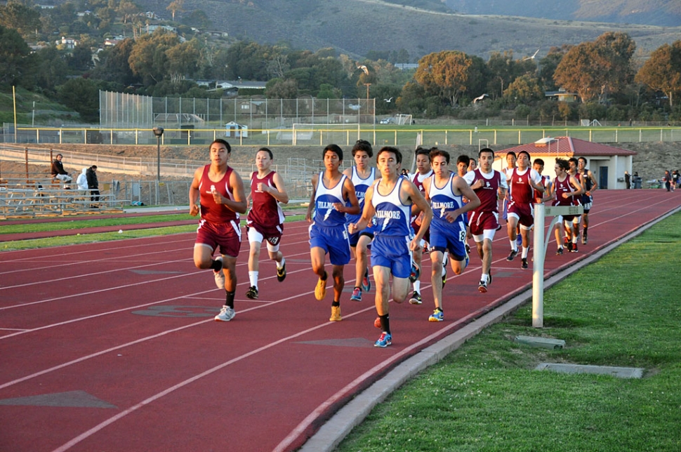 Boys 3200 meters lead by Jose Almaguer followed by teammates Anthony Rivas, Alexander Gonazalez and Alexander Frias.