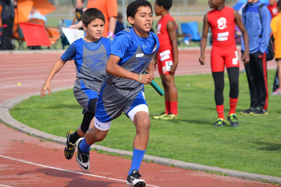 3rd Place Midget Boys 4X100m Relay team (59.99) (left) Richard Vega (right) Joshua Morales.