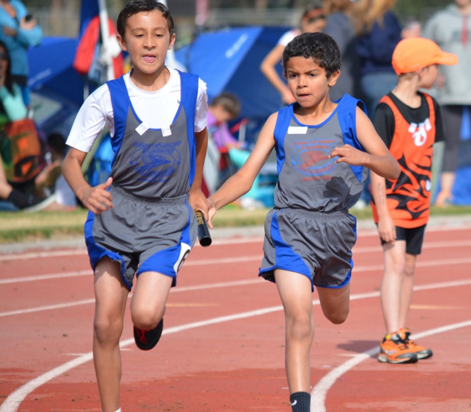 Bantam 4 letter x 100m Relay team left Stevan Martinez right Carmelo Grandison.