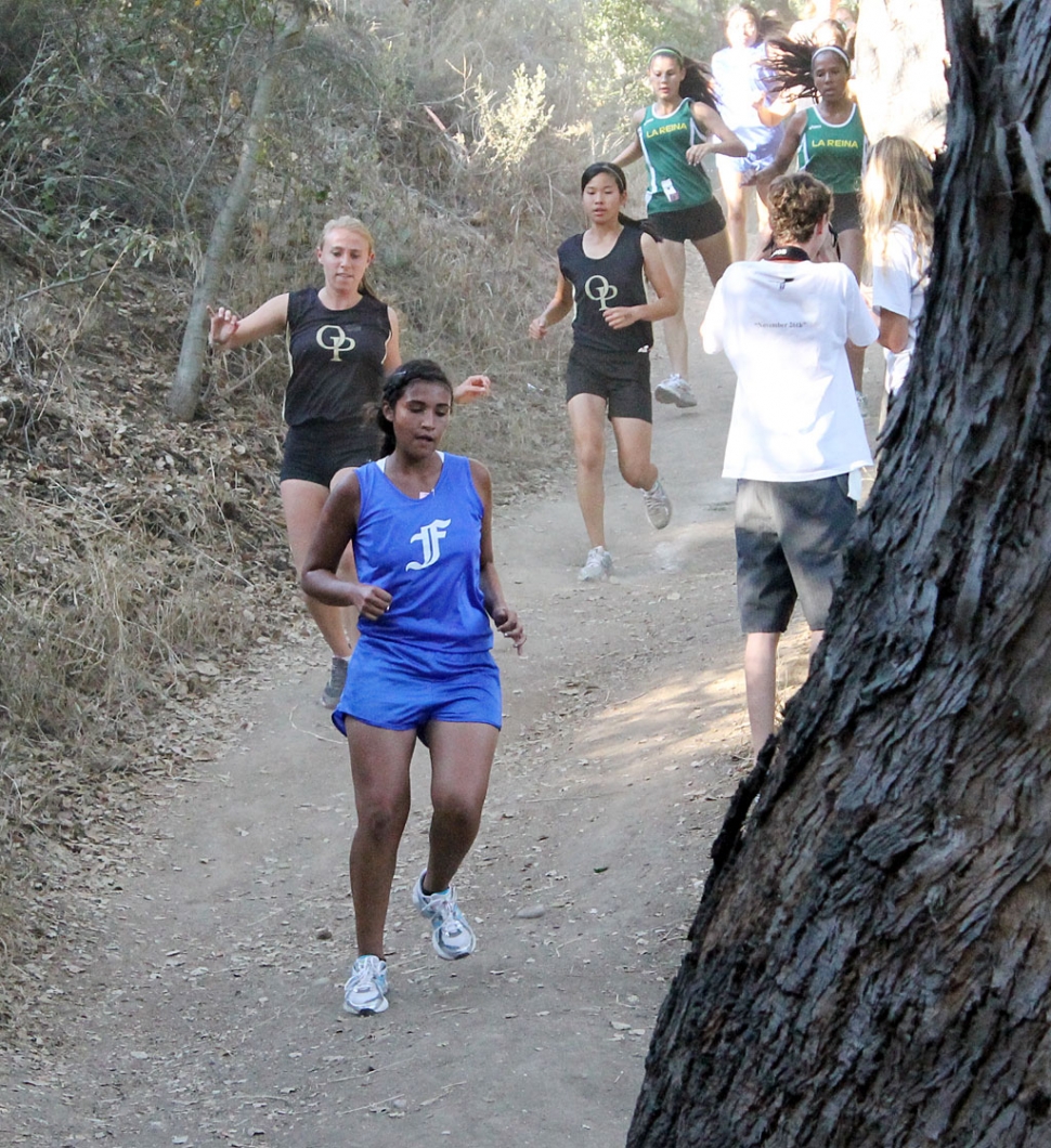 Justine DeLa Rosa competes against Oak Park and La Reina during league last week.