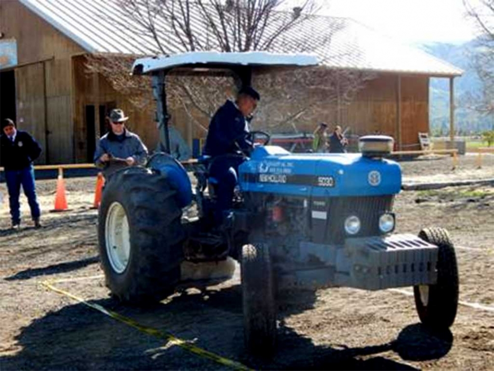 Pictured is Juan Castrejon of Fillmore being judged on the three point hook up. Tractors were donated by Don Palmer (Palmer Ranch Management), Mike Richardson (Quality Ag.) and Jim LeBard (Fillmore Rentals). Schools came from Bakersfield, Santa Maria, Carpinteria, Santa Paula, Fillmore, and Camarillo. Results: Novice -1st place team-Camarillo High School; Novice High Individual-Bryson Koshanski, Highland High School, Bakersfield. Advanced 1st Place Team- Fillmore High School. Advanced High place individual - Luke Rodriquez, Camarillo High School.