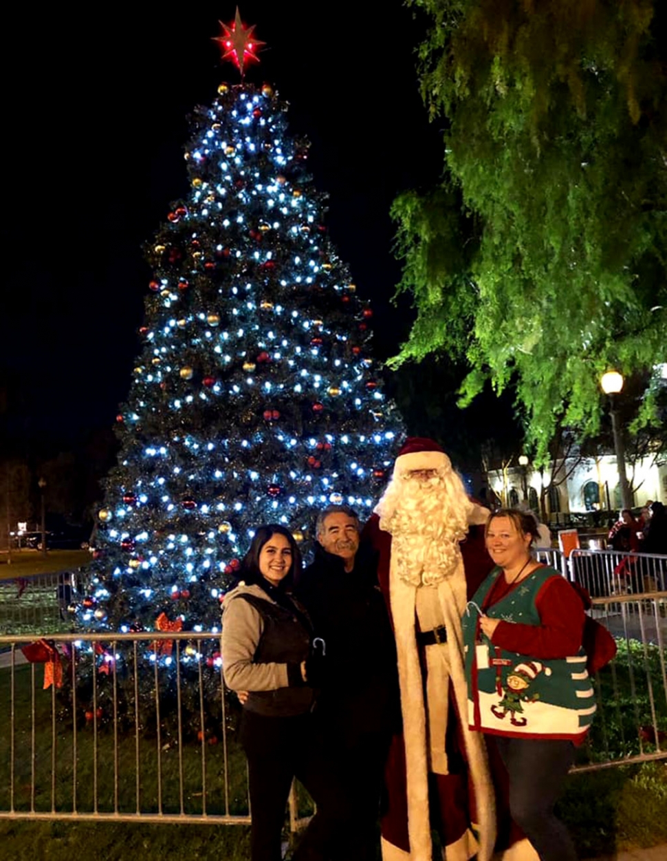 Thank you to all who came out to the 2nd annual City of Fillmore Community Tree Lighting this past Sunday, December 1st. We’d like to thank the Orange Peelers Bell Choir & Sembradores Church Choir for coming out to perform and for giving free hot chocolate, cookies and treats to everyone in attendance! We’d also like to thank Fillmore & Western Railway as an in kind sponsor for this year’s beautiful tree, Diamond Realty & Villegas Public Affairs for tree decorations, Diane and Steve Sutton for the custom star & last but not least City of Fillmore Fire Chief Keith Gurrola and the entire Fillmore City Fire Department for their hard work and dedication to our tree AGAIN this year. Lastly, thank you to Mayor Diane McCall for the appreciation speech and leading our countdown! Lighting the tree this year was Ariana Ocegueda, Miss Fillmore 2019 and her court. There was even a special visit from Santa Claus thank you Santa for making a special stop in Fillmore for Fillmore’s Community Tree Lighting! [Courtesy City of Fillmore Facebook Page]