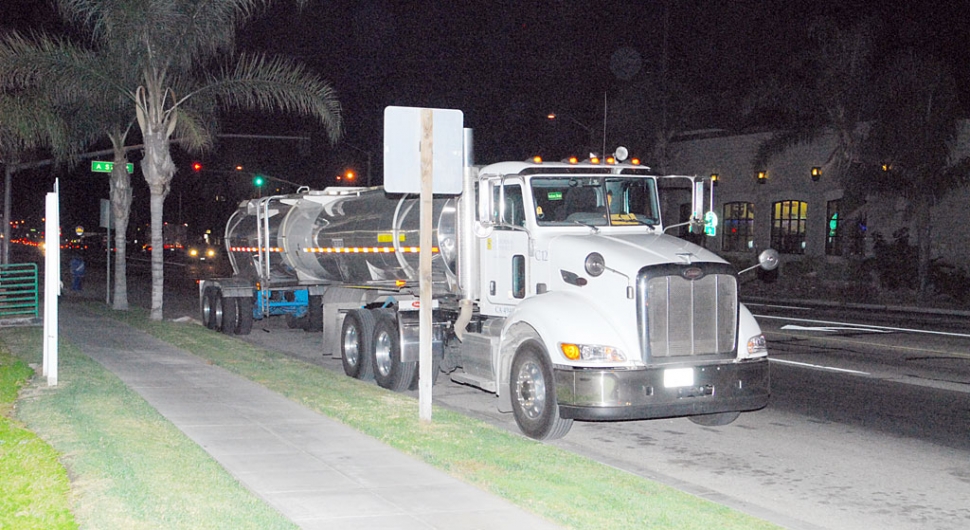 A little molten sulfur with your mocha, anyone? Big rigs like this one carrying Molten Sulfur have been parking illegally on Hwy. 126 in front of Starbucks, despite the Right Turn Only sign--inset. They block the right-turn lane and present a real danger of unaware drivers turning the corner and rear-ending them from A Street. Also, cars attempting to turn right from the Vons parking lot onto Hwy 126 have their view blocked. We need a NO PARKING sign here! And, maybe an IQ drivers test.