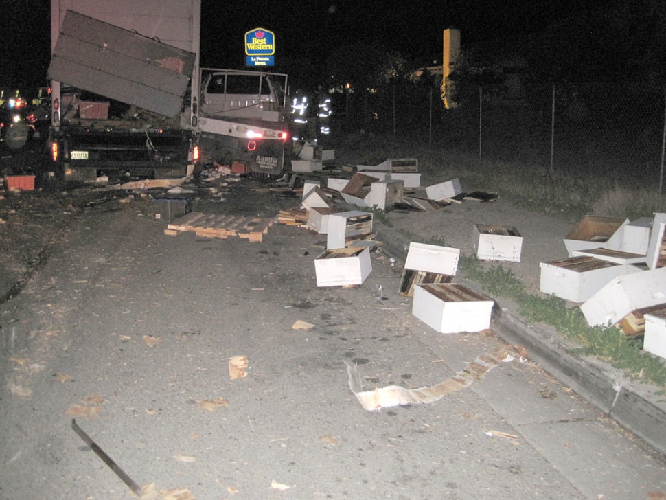 One of the parked trucks that was hit carried 600 gallons of syrup/pollen mixture used to feed bees. 