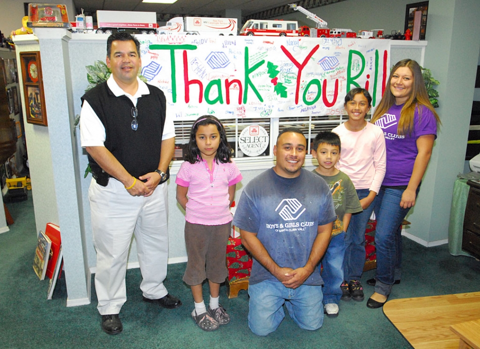 State Farm Insurance Agent Bill Herrera Jr., left, donated two turkeys to the Fillmore/Piru Boys & Girls Club over the holidays. The turkeys served 108. Pictured (l-r)are Herrera, Jackie Chavez-8, Omero Martinez, Adrian Martinez-6, Reylene Martinez-9, and Nancy Luna.